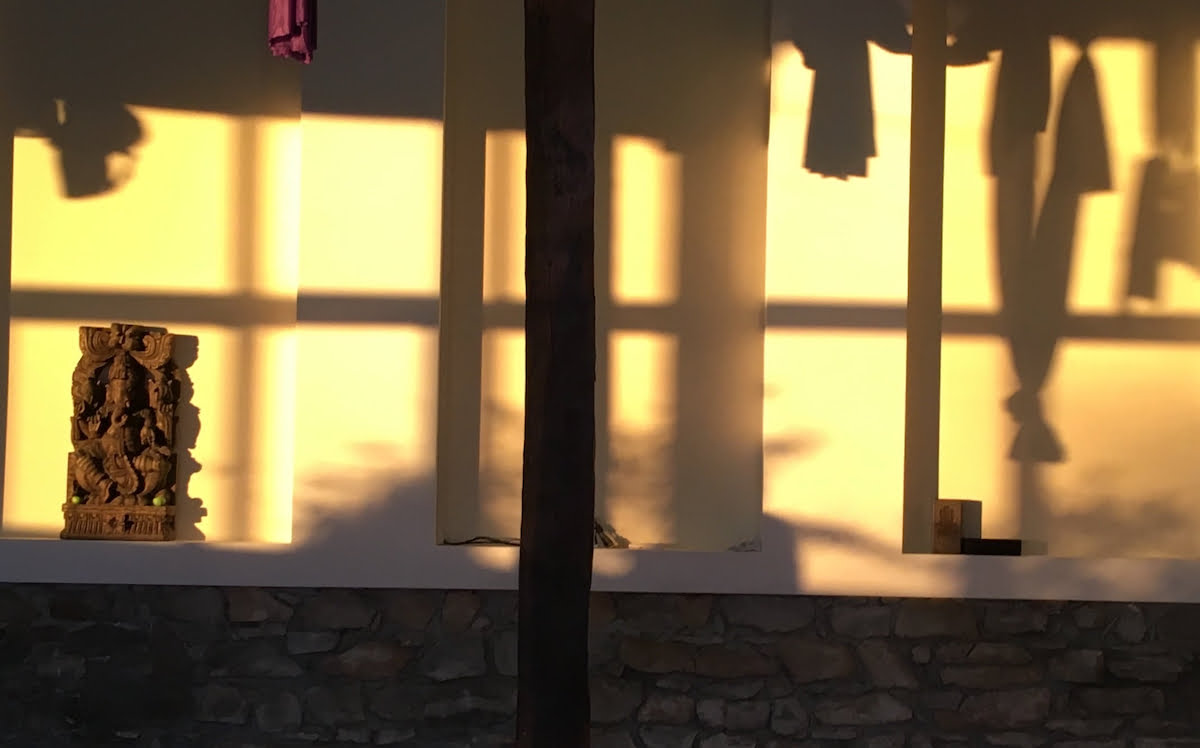 Indoor view of a yoga center at sunset